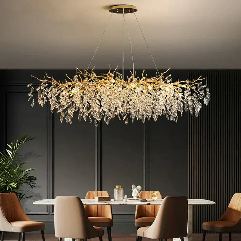 Gold-toned decorbites crystal chandelier with intricate crystal leaf designs for living room lobby and hotel lighting