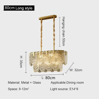 Gold-toned decorbites crystal chandelier with cascading fan-shaped glass panels suspended from twisted metal chains