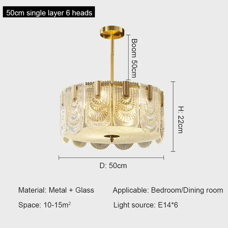 Gold-toned decorbites crystal chandelier with six glass fan-shaped heads and metallic frame for modern luxury spaces