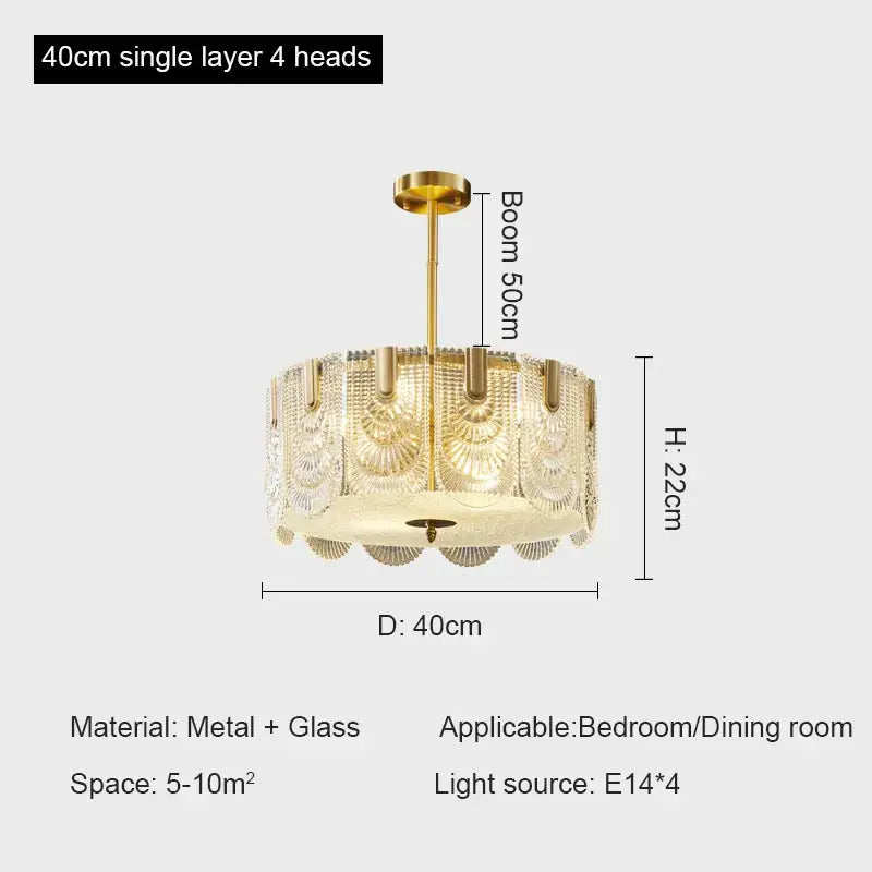 Gold-toned decorbites crystal chandelier with four glass shades featuring fan-like patterns for modern luxury lighting