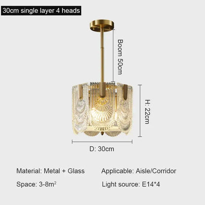 Gold-toned decorbites crystal chandelier with four ornate fan-shaped glass panels for modern luxury lighting
