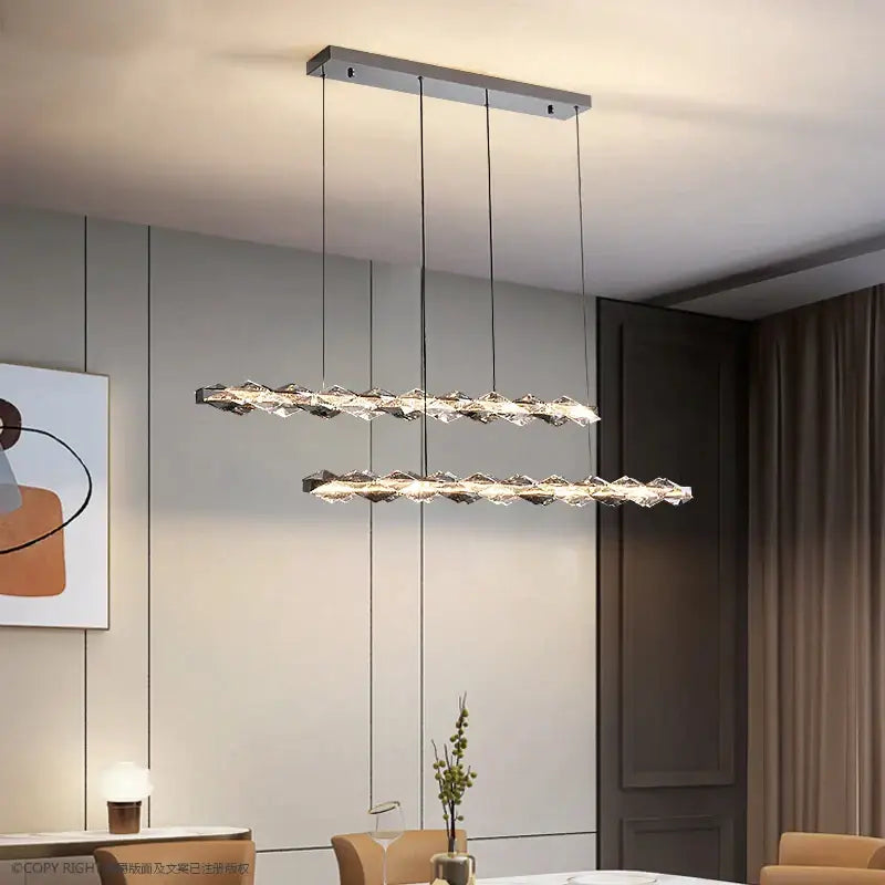 Modern rectangular decorbites crystal chandelier with sleek chrome finish and cascading crystal elements for ambient lighting