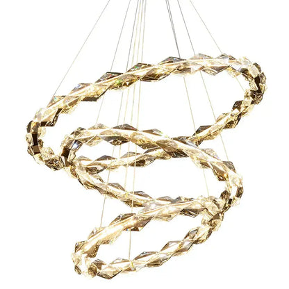 Golden crystal chandelier with three interlocking rings from decorbites crystal chandelier for modern luxury staircases