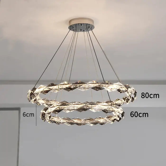 Modern decorbites crystal chandelier with faceted crystals and chrome finish, double-ring design for duplex staircases