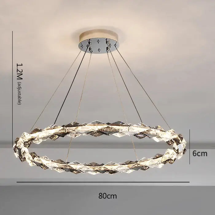 Decorbites crystal chandelier featuring a modern circular design with chrome finish and faceted clear crystal ring