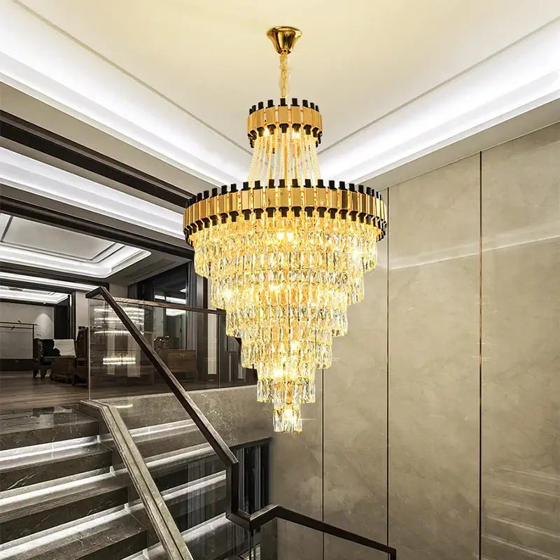 DecorBites crystal chandelier with golden metal frames and clear crystal prisms for modern luxury spaces