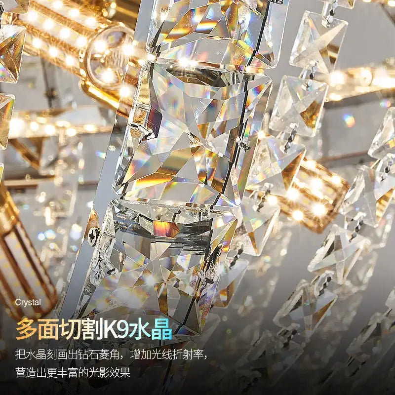 Decorbites crystal chandelier with faceted k9 crystal prisms on a polished gold frame for modern luxury lighting
