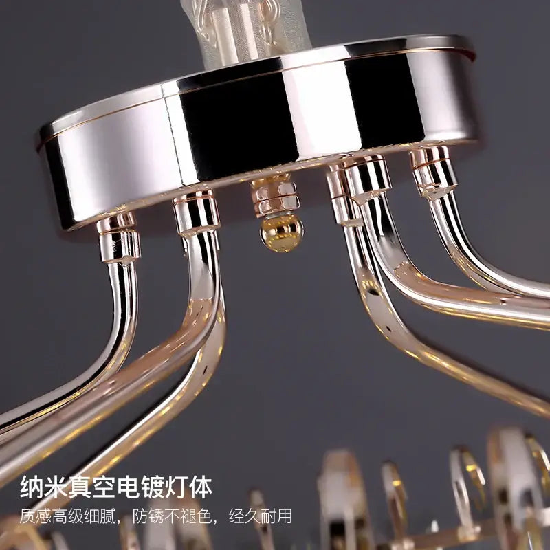 Decorbites crystal chandelier with chrome finish and curved glass arms on polished metallic base for modern luxury spaces