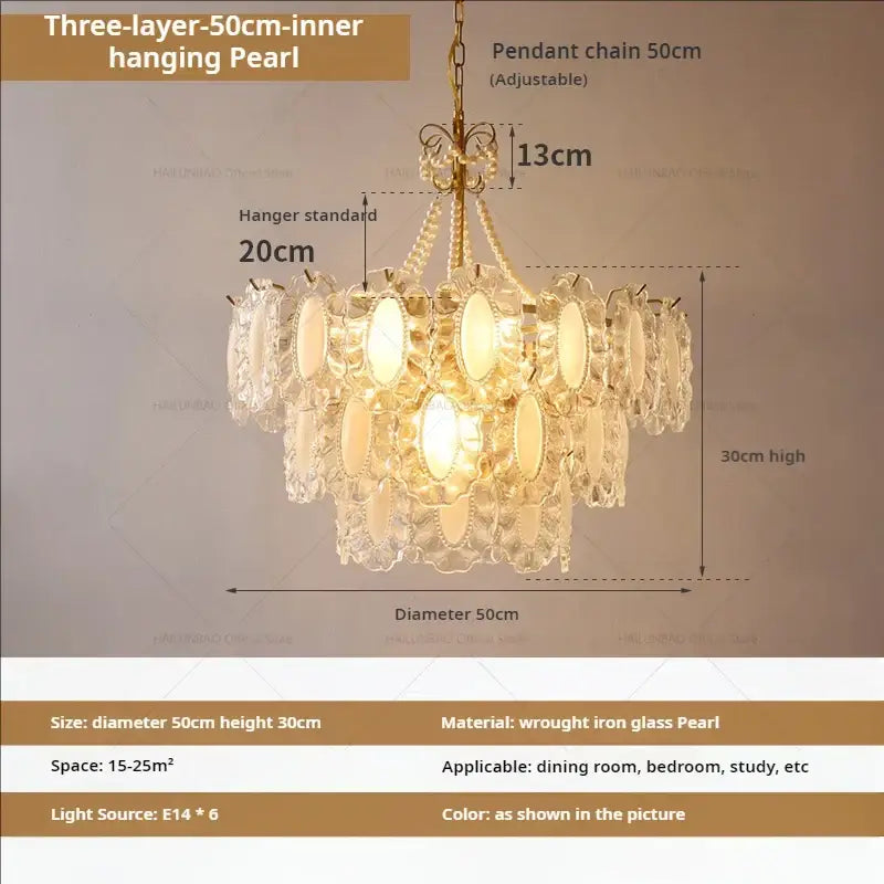 A three-layer decorbites crystal chandelier with golden wrought iron frame and pearlescent discs for living room and bedroom