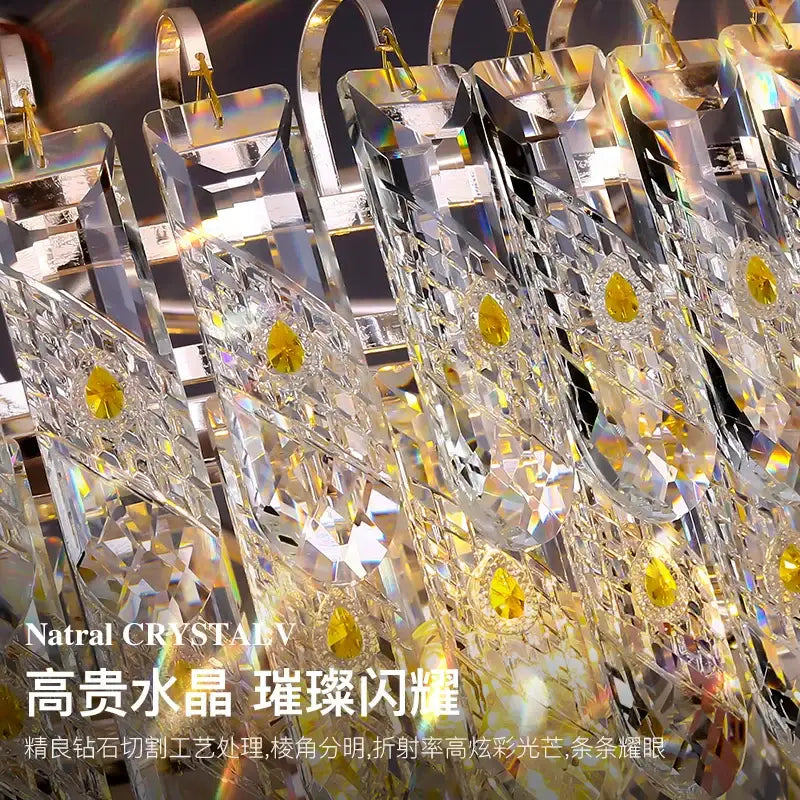Clear crystal chandelier arms with faceted cuts and golden teardrop accents in decorbites crystal chandelier design