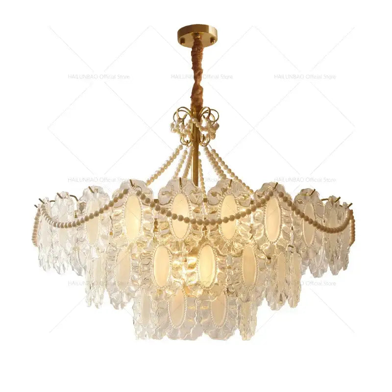 A decorbites crystal chandelier featuring multi-tiered clear oval crystal droplets with gold-toned metal accents for modern luxury living room and bedroom lighting