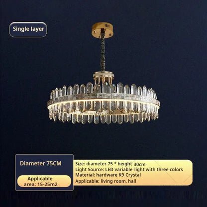 A decorbites crystal chandelier with a gold-finished frame and cascading k9 crystal prisms for modern luxury interiors