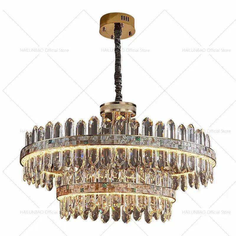 A decorbites crystal chandelier featuring a luxurious two-tiered design with gold-toned metal and clear prisms