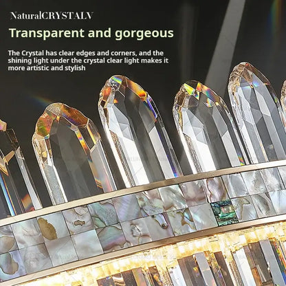 Clear faceted crystal prisms with iridescent edges on a polished metallic base in the DecorBites crystal chandelier