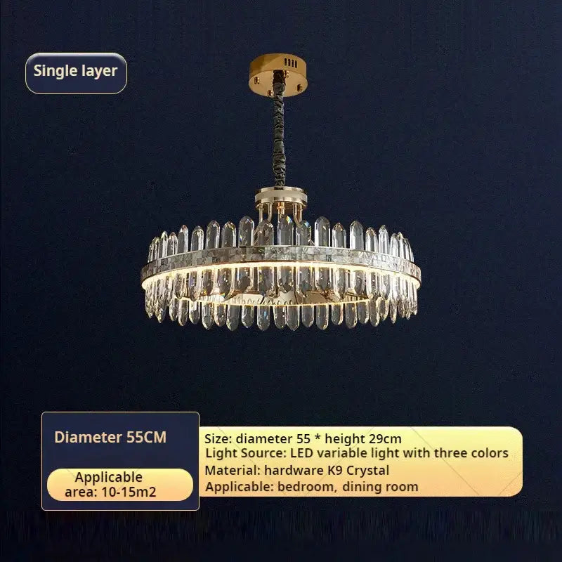 Elegant gold-toned decorbites crystal chandelier with cascading k9 crystal prisms for modern luxury interiors
