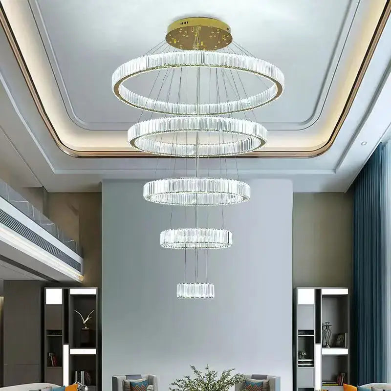 Modern multi-tiered decorbites crystal chandelier with concentric rings and gold-toned ceiling mount for villa lighting