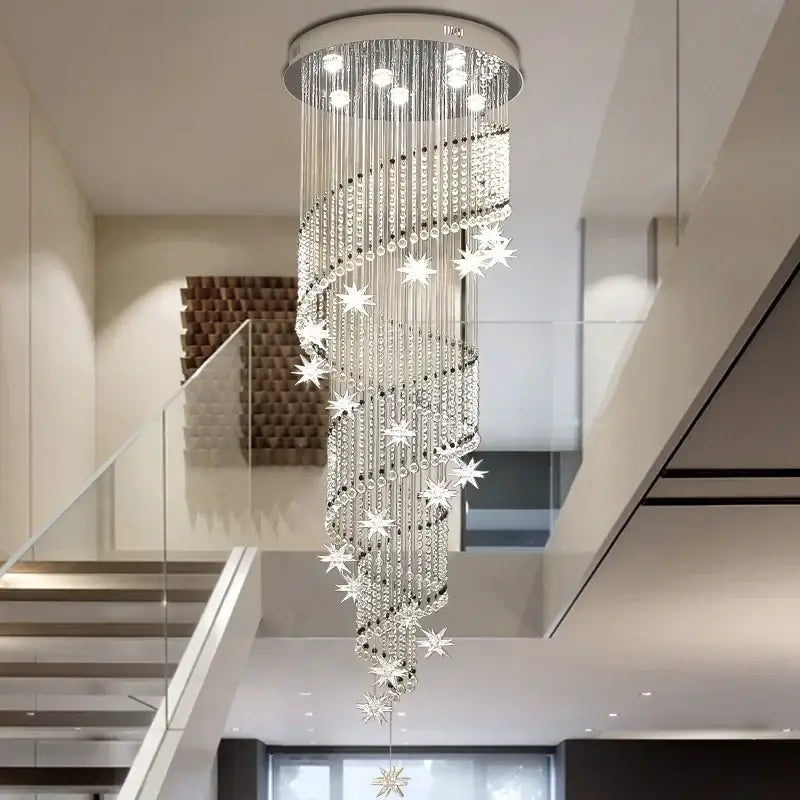 DecorBites crystal chandelier with modern silver metal frame, cascading crystal strands and star-shaped ornaments for luxury lighting