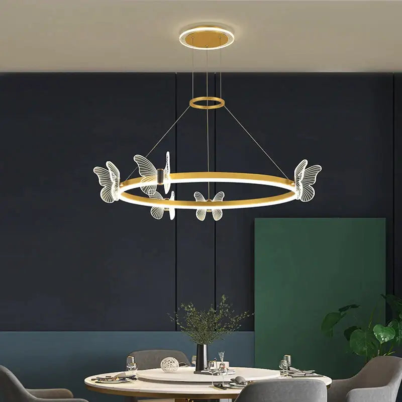 Gold-toned decorbites crystal chandelier pendant light with translucent white butterfly accents for modern luxury lighting