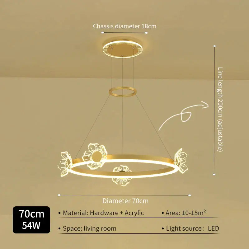 Gold-toned circular decorbites crystal chandelier with floral acrylic accents and adjustable hanging length for modern luxury lighting