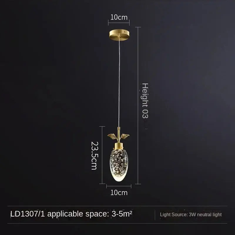 A modern decorbites crystal chandelier with gold-toned metal frame and oval glass globe filled with sparkling particles