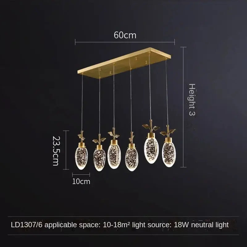 Gold-toned rectangular decorbites crystal chandelier with five egg-shaped crystal globes and leaf-like finials in nordic style