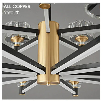 Modern decorbites crystal chandelier with brushed gold copper body black and white geometric arms and crystal accents for living rooms