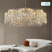 DecorBites crystal chandelier with cascading teardrop crystals and metallic frame for living room luxury lighting