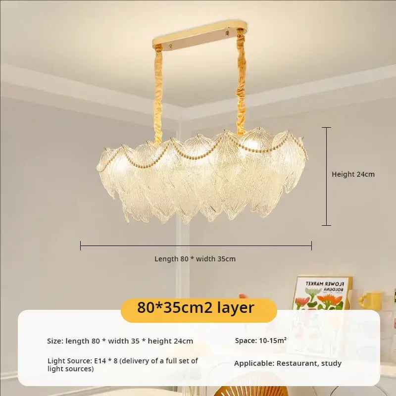 A decorbites crystal chandelier with two layers of translucent glass petals and gold-toned metal for modern luxury lighting