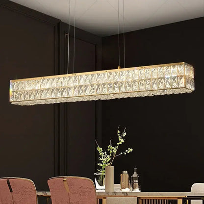 Gold-toned decorbites crystal chandelier with faceted crystal panels for modern luxury living room and restaurant lighting