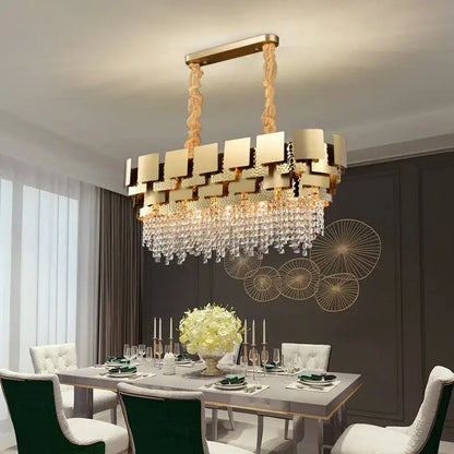 Gold-toned decorbites crystal chandelier with modern geometric design and cascading crystal droplets for luxury lighting