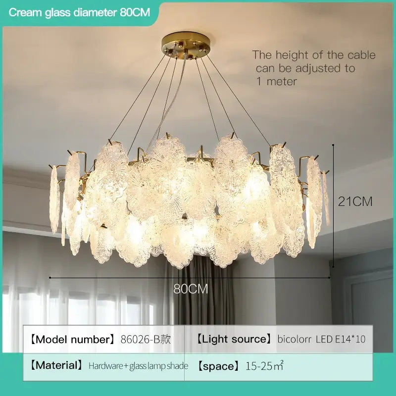 A delicate cream glass decorbites crystal chandelier with lace-like patterns and gold metal frame for luxury living rooms