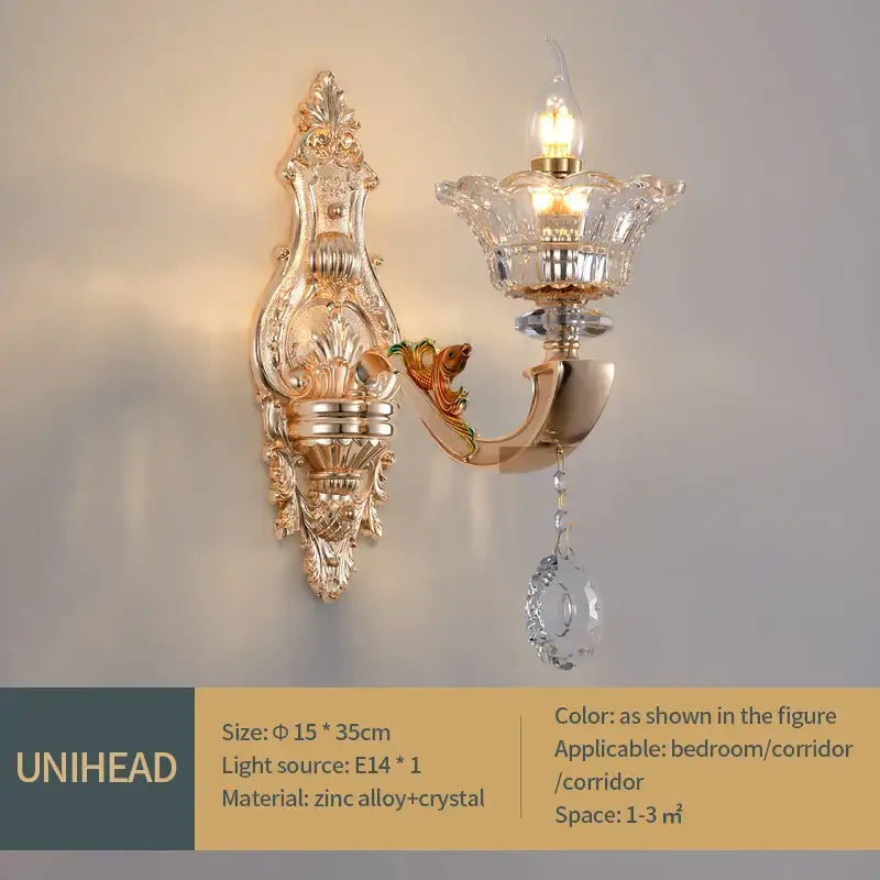 Gold-toned ornate decorbites crystal chandelier pendant with crystal accents and dangling drop for villa duplex and hotel lobby