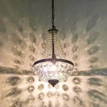 Decorbites crystal chandelier pendant lamp with dark metal frame and cascading clear crystals for dining room lighting