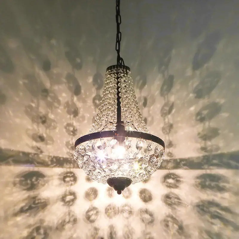Decorbites crystal chandelier pendant lamp with dark metal frame and cascading clear crystals for dining room lighting