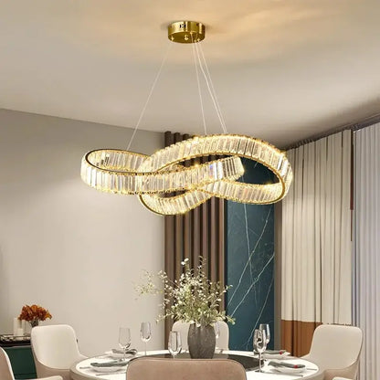 Gold-toned decorbites crystal chandelier pendant lamp with faceted crystal accents for modern dining and living rooms