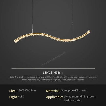 A sleek curved gold decorbites crystal chandelier pendant lamp with embedded k9 crystals for living room use
