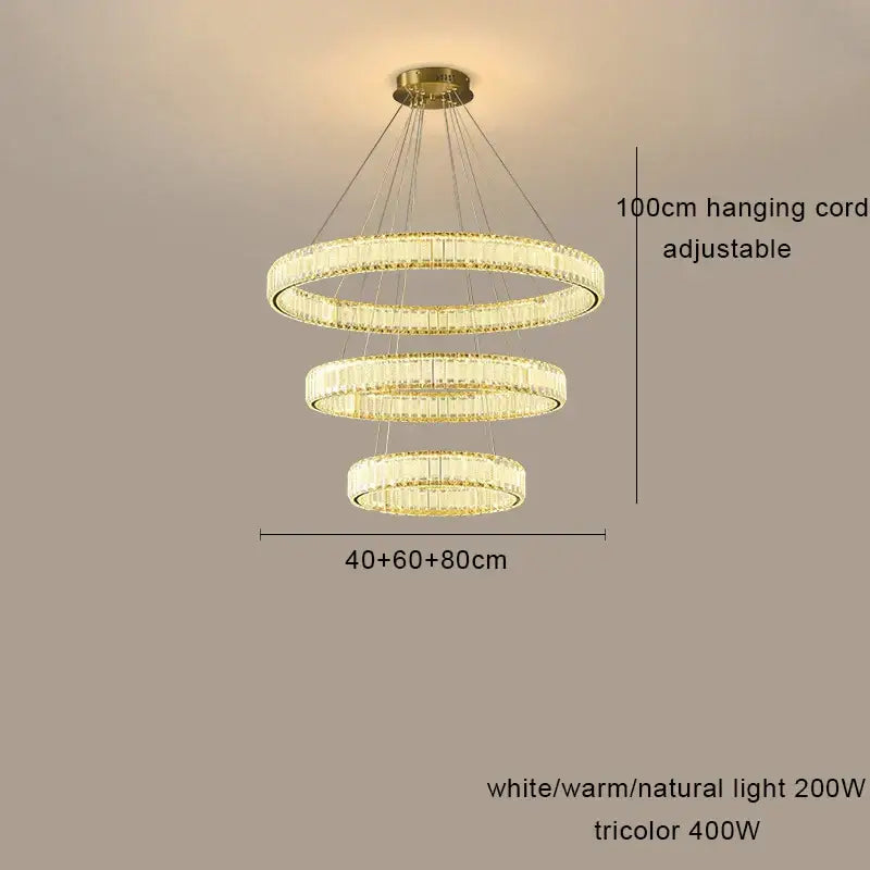 A modern decorbites crystal chandelier pendant lamp with cascading golden rings and clear crystals for living room lighting