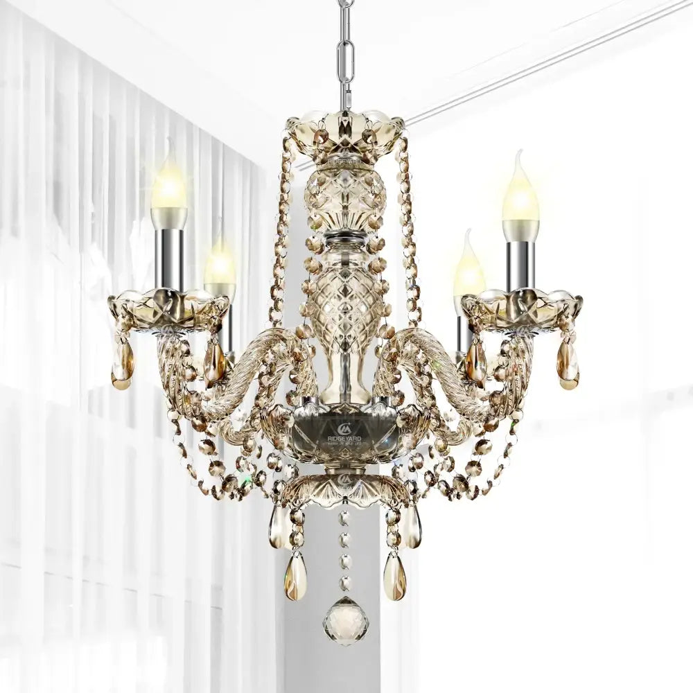 Elegant gold-toned decorbites crystal chandelier with intricate cut glass and dangling beads for luxury living spaces