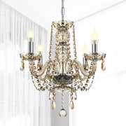 Elegant gold-toned decorbites crystal chandelier with intricate cut glass and dangling beads for luxury living spaces