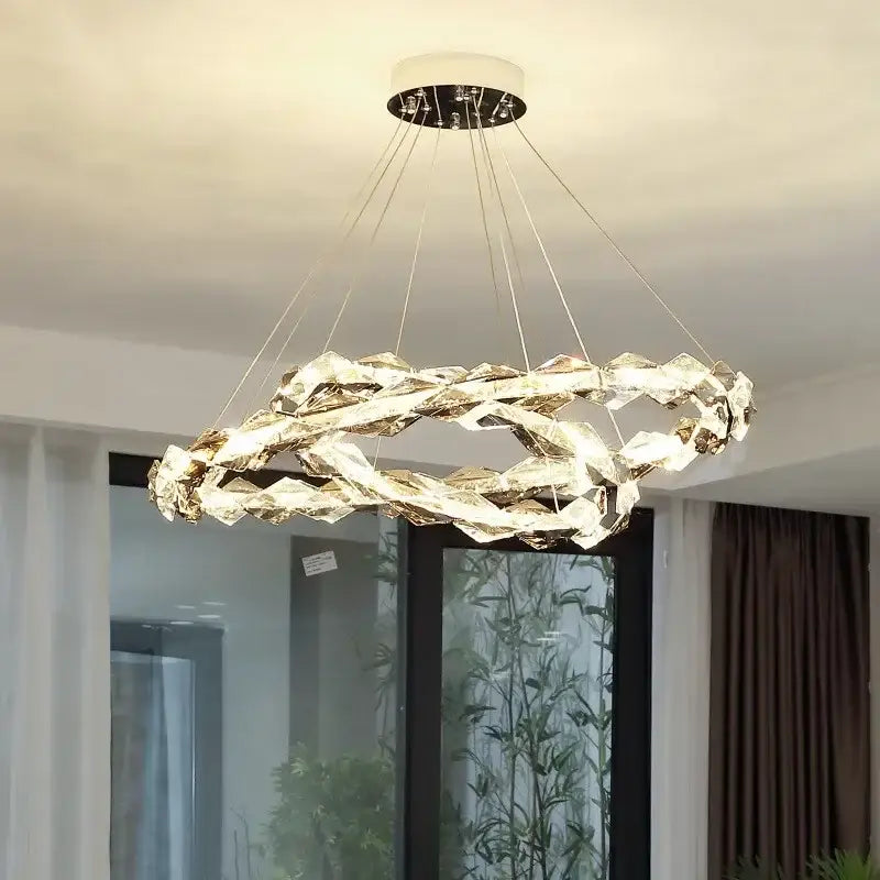 Modern decorbites crystal chandelier pendant light with interlocking rings chrome finish and warm dimmable LED lighting
