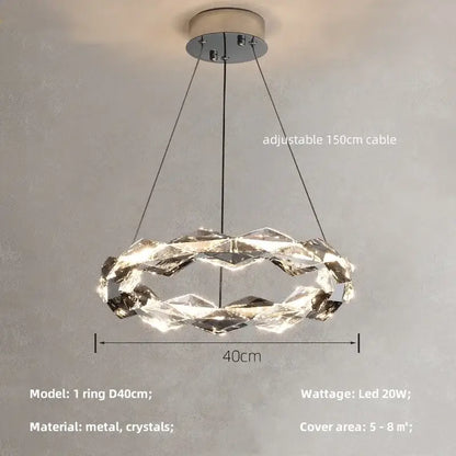 Modern DecorBites crystal chandelier pendant light with metallic ring and faceted clear crystals in interlocking design