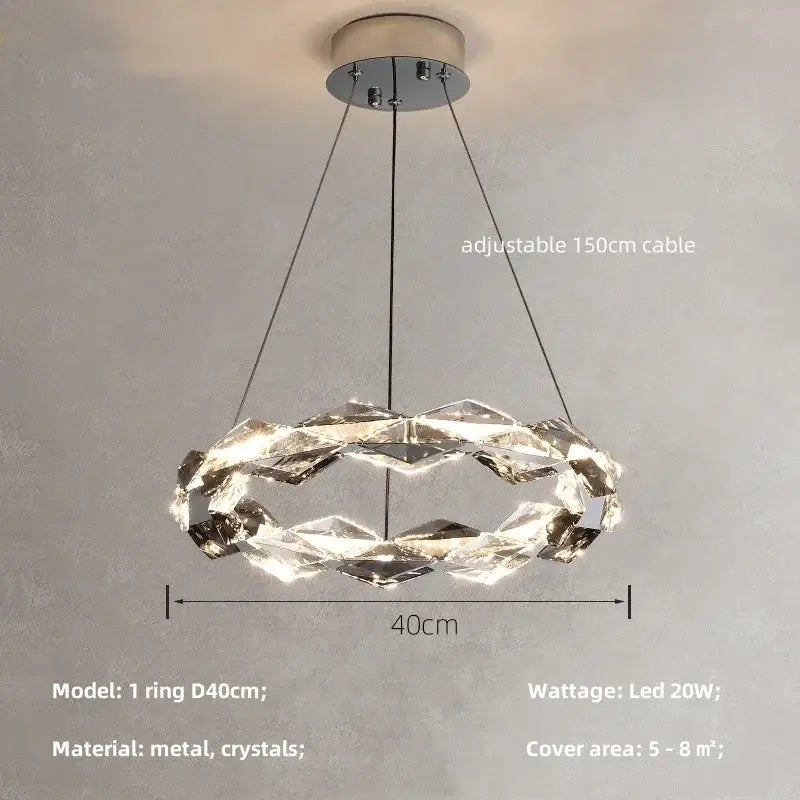 Modern DecorBites crystal chandelier pendant light with metallic ring and faceted clear crystals in interlocking design