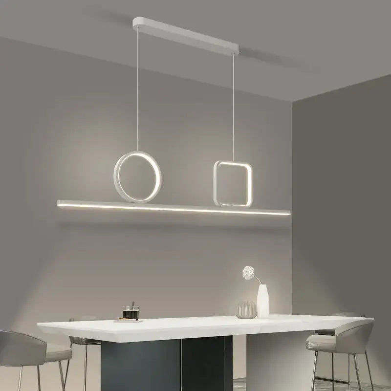 Modern white led decorbites crystal chandelier pendant light with geometric shapes suspended above dining table