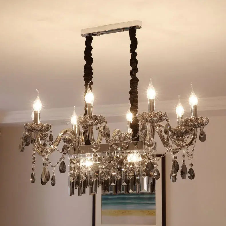 Silver decorbites crystal chandelier pendant light with intricate crystal droplets and candle-style bulbs for dining room