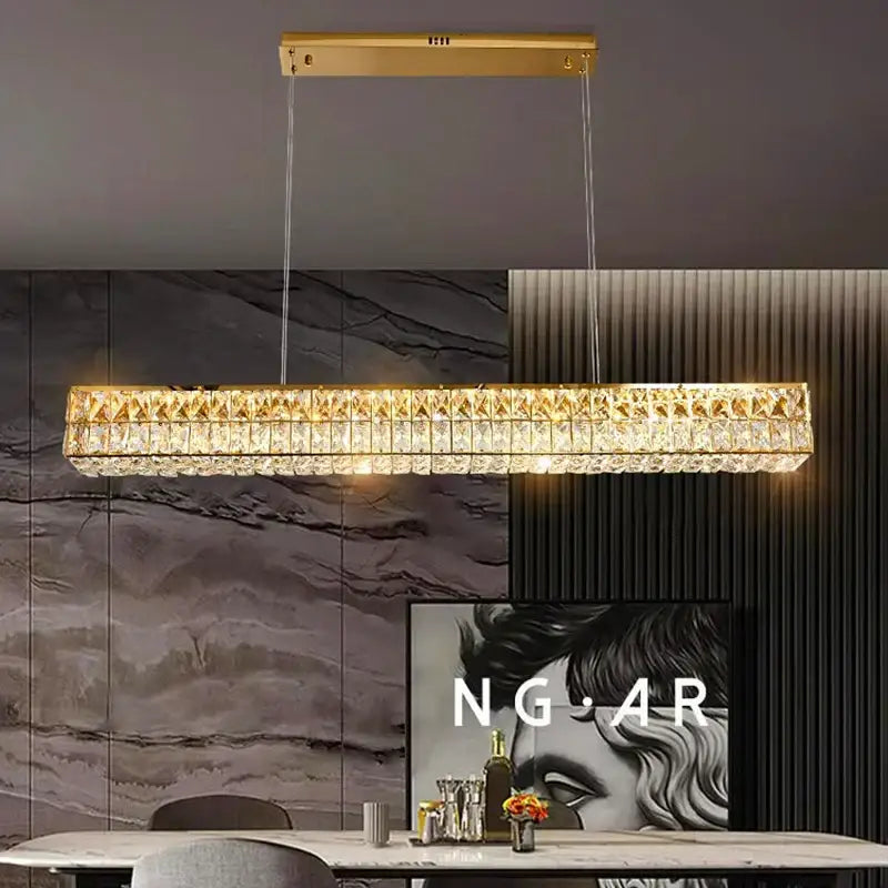 Gold-toned decorbites crystal chandelier pendant light with faceted crystal accents for living and dining rooms