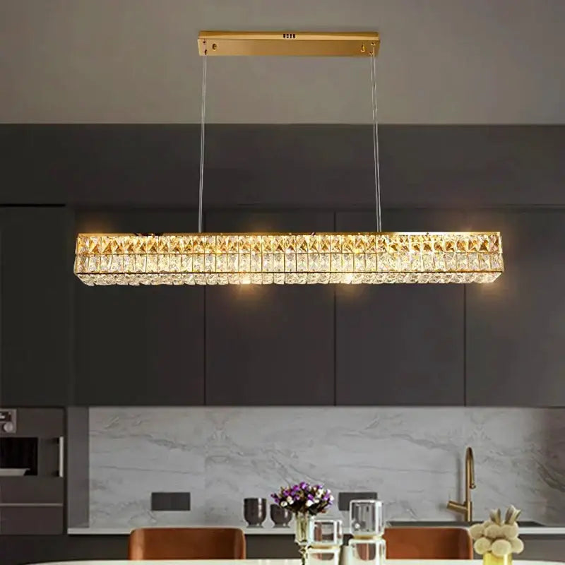 Gold-toned DecorBites crystal chandelier pendant light with faceted crystal accents for living and dining room lighting