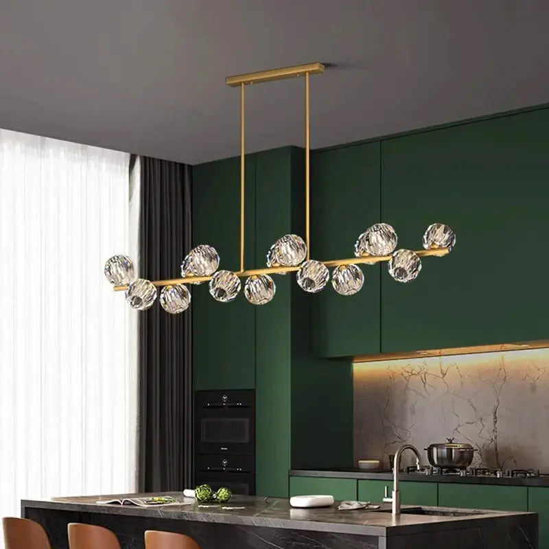 Gold-toned decorbites crystal chandelier pendant light with faceted crystal globes for living and dining room luxury decor