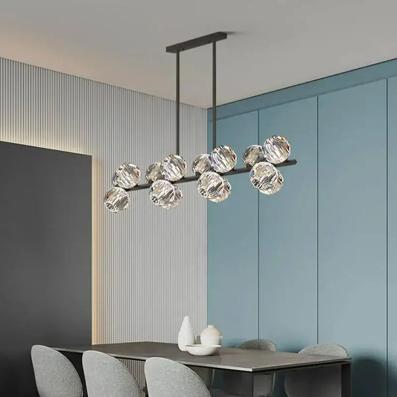 Modern black metal DecorBites crystal chandelier pendant light with clear faceted glass globe bulbs for living and dining room luxury decor
