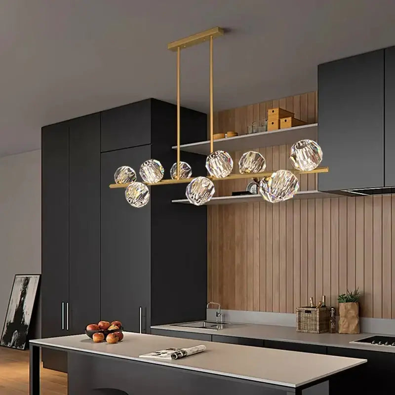 Gold-toned decorbites crystal chandelier pendant light with faceted crystal globe shades for living and dining room luxury decor