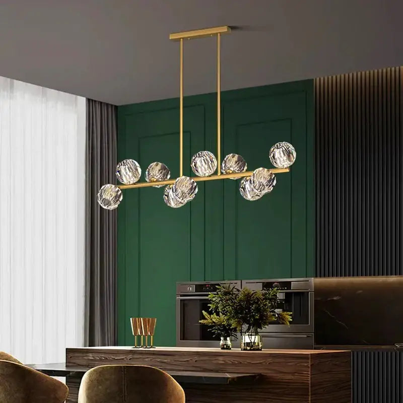 Gold-toned decorbites crystal chandelier pendant light with eight faceted crystal globe lights for living and dining room luxury decor